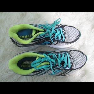 Blue and neon saucony tennis shoes